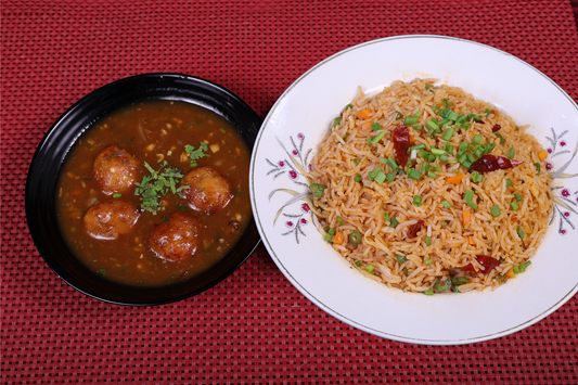 [Veg Combo] - Vegetable balls in Manchurian sauce served with Szechuan fried rice